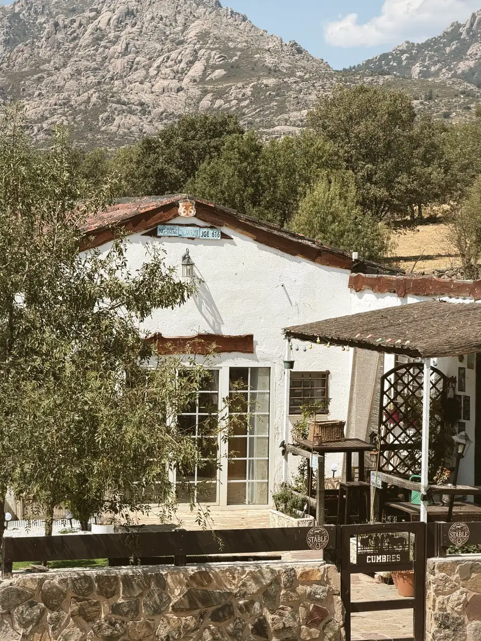 The Madrid Horse Tour house with La Pedriza behind